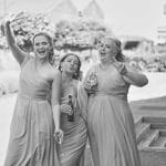 3 Bridesmaids pose to camera